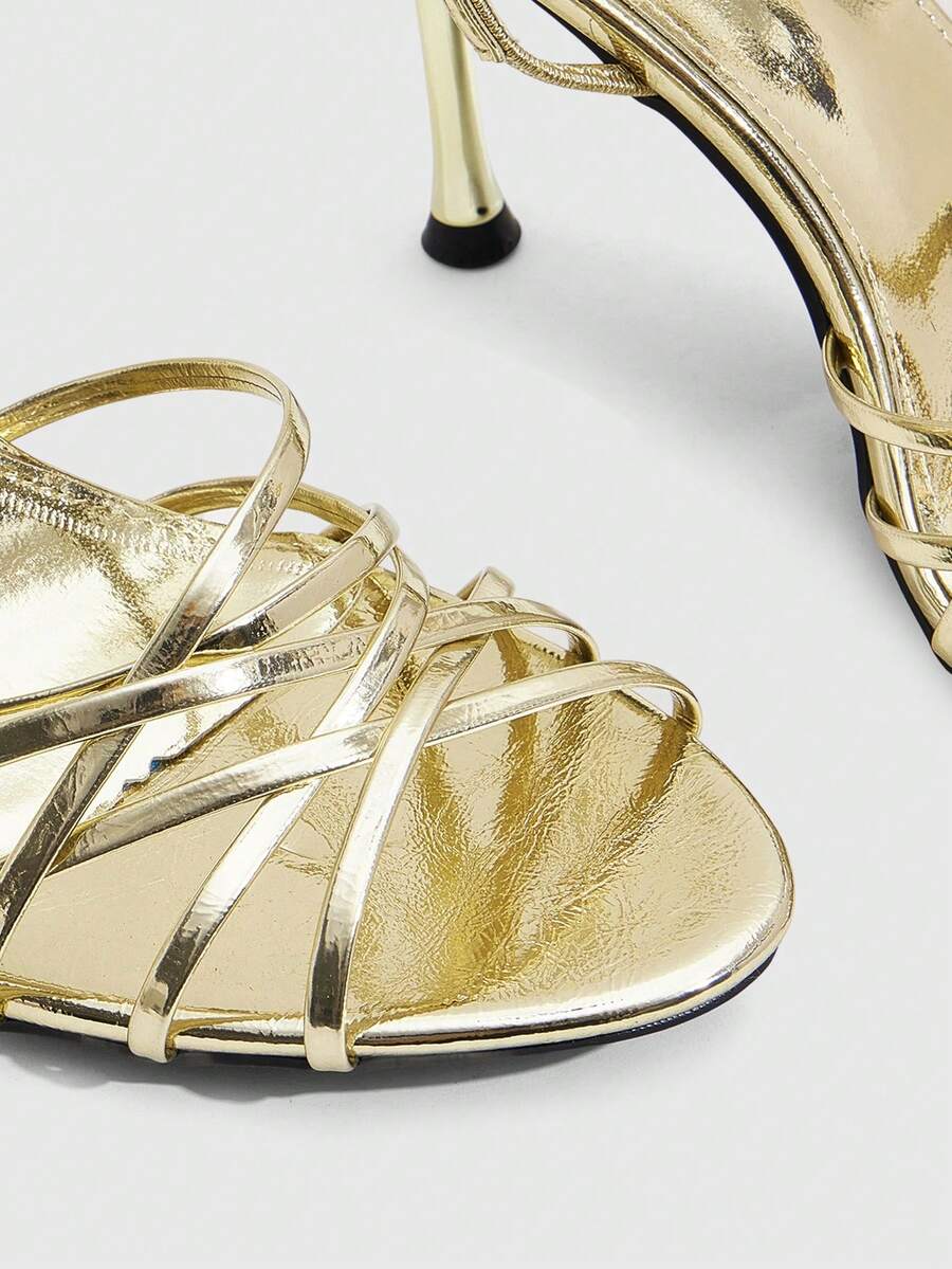 Women's cross strap square heel sandals featuring open toe and slingback design