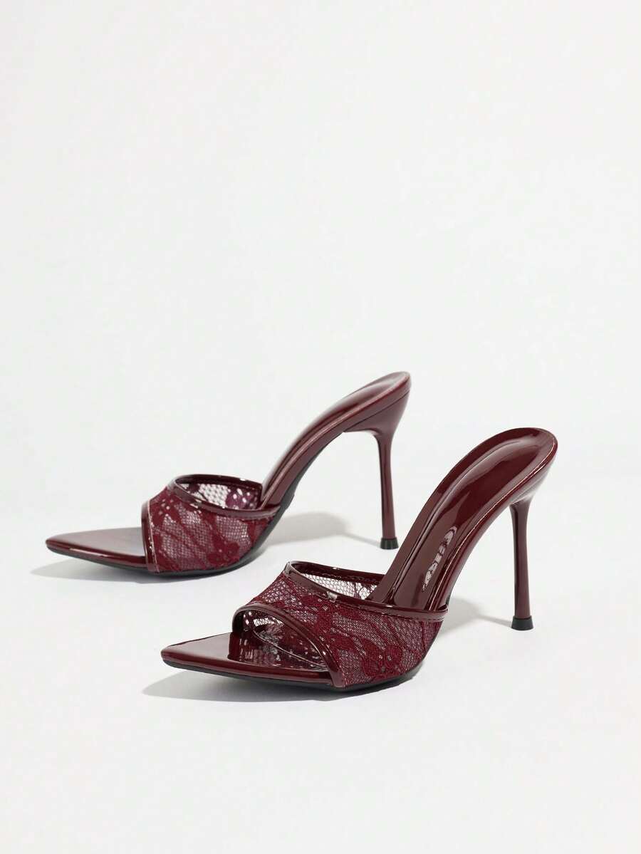 Women's elegant open toe high heel party mules featuring sleek stiletto heels and a slip-on design.