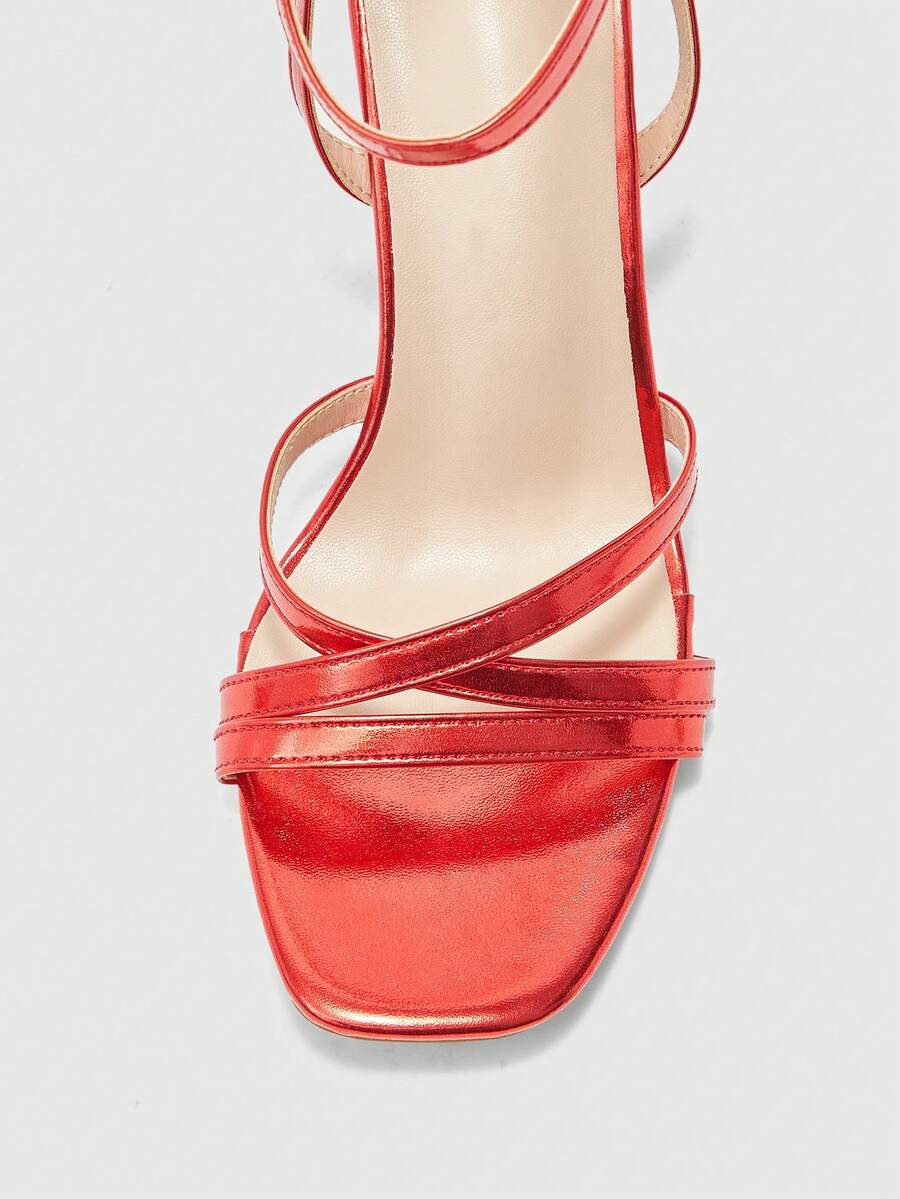 Square toe stiletto high heel sandals with crisscross strappy design and adjustable ankle buckle strap in light blue.