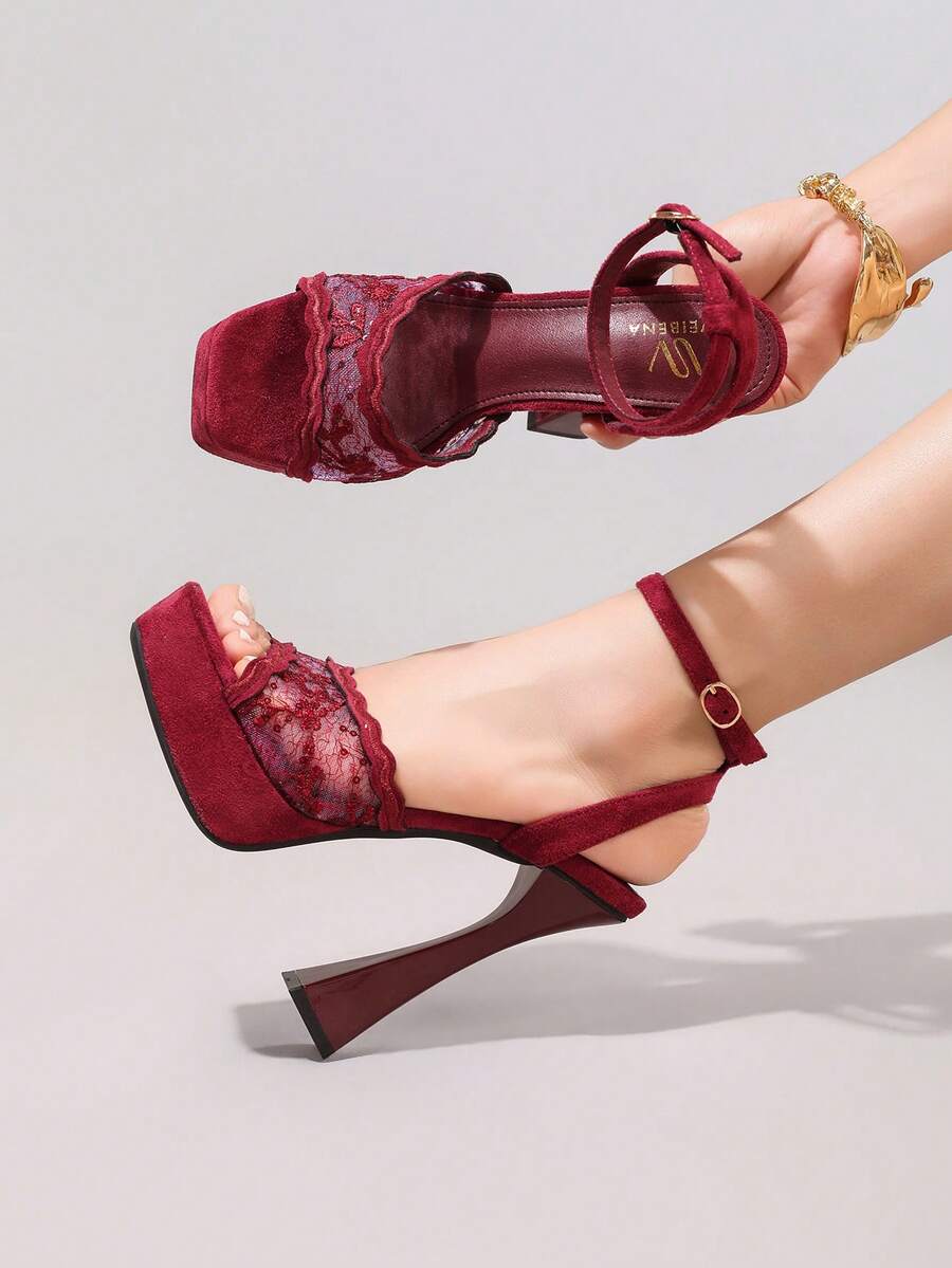 Lace embroidered open toe high heel sandals featuring a chunky square heel, platform wedge, and ankle strap buckle closure.