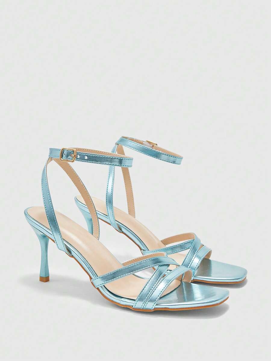 Square toe stiletto high heel sandals with crisscross strappy design and adjustable ankle buckle strap in light blue.