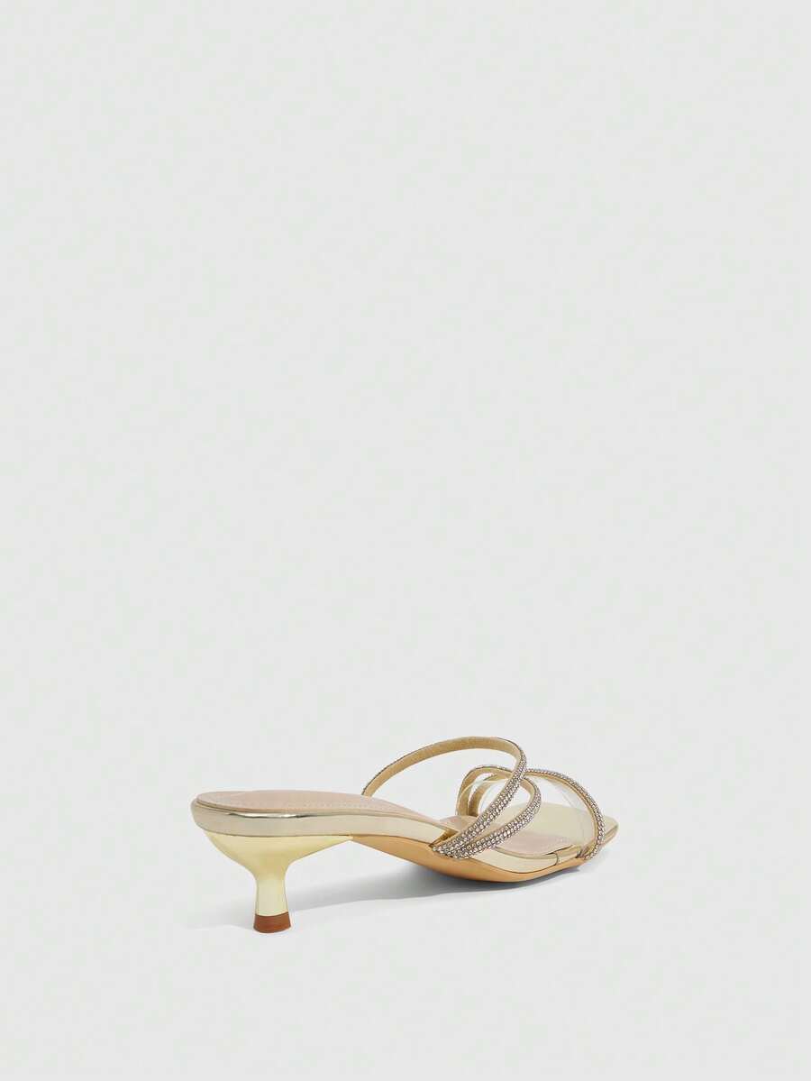 Square toe kitten heel sandals with sparkling rhinestone strap in light gold PU leather
