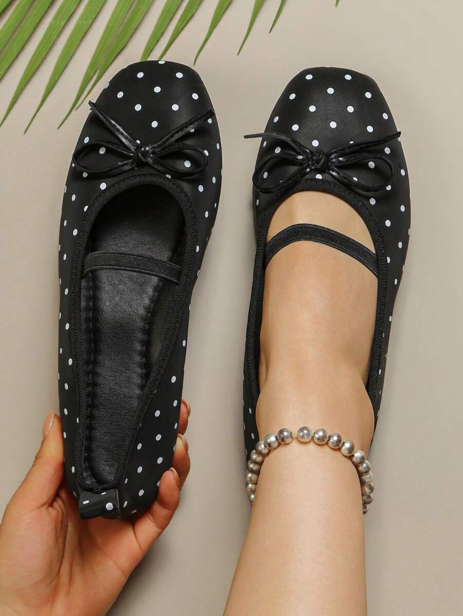 Square toe ballet flat shoes with bow detail and slip-on wide fit design.