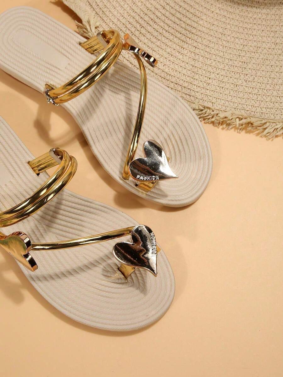 Women's lace-up flat slip-on sandals with round toe and hollow-out PU leather straps for beach and daily wear.