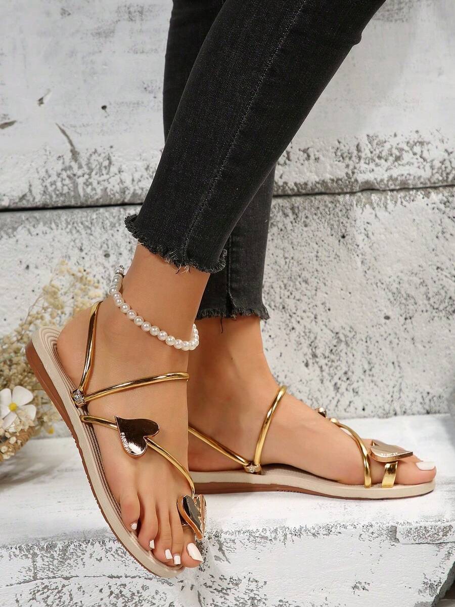 Women's lace-up flat slip-on sandals with round toe and hollow-out PU leather straps for beach and daily wear.