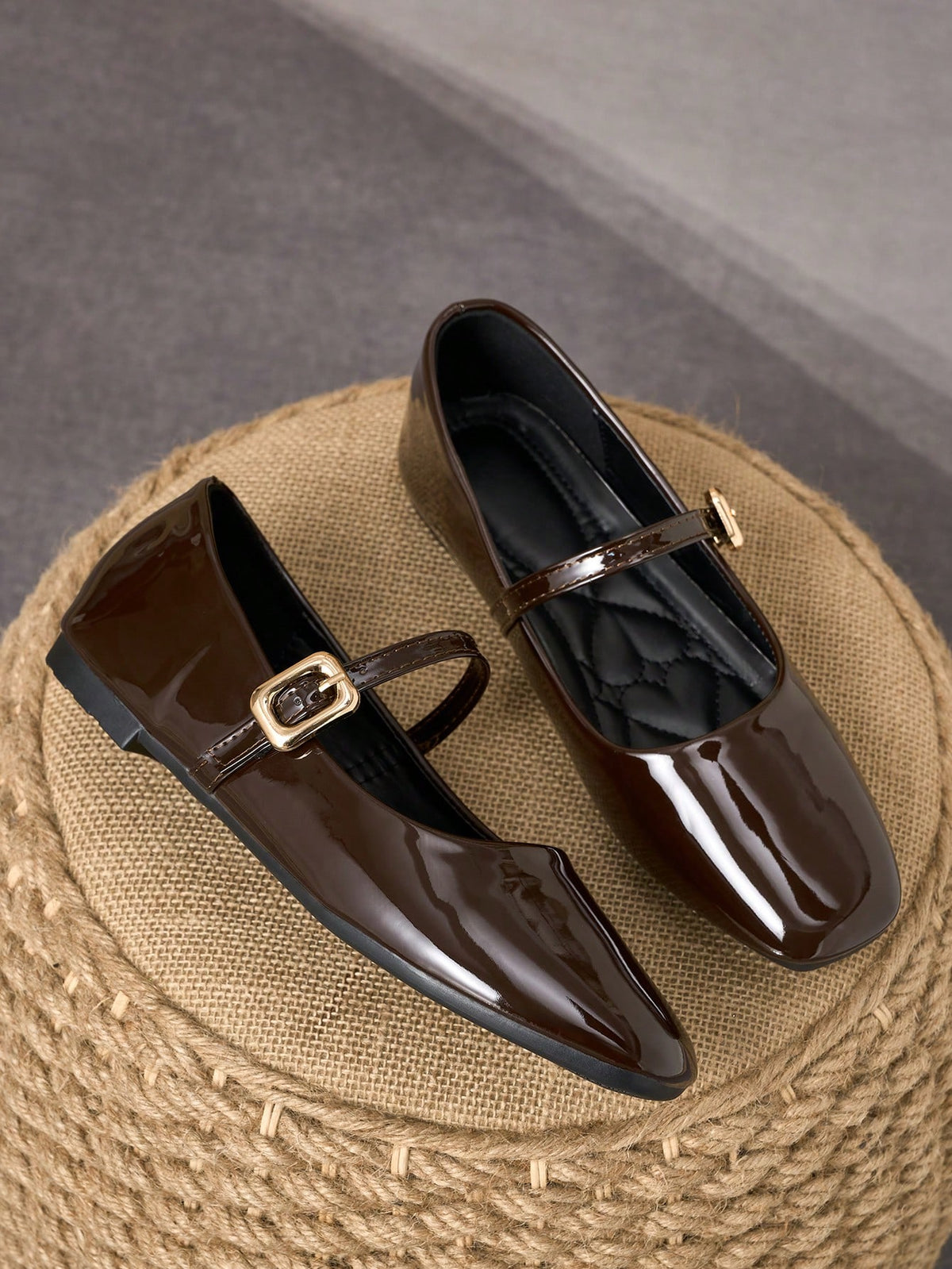 Pair of women's square toe slip-on flat shoes featuring a delicate bow detail and low vamp design.
