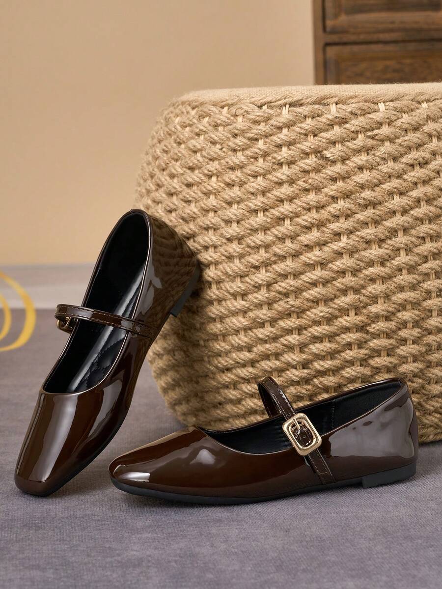Pair of women's square toe slip-on flat shoes featuring a delicate bow detail and low vamp design.