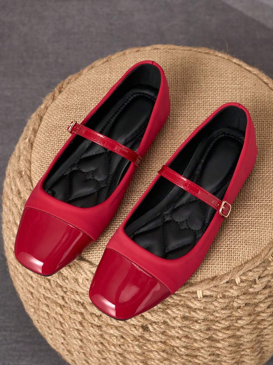 Pair of women's square toe slip-on flat shoes featuring a delicate bow detail and low vamp design.