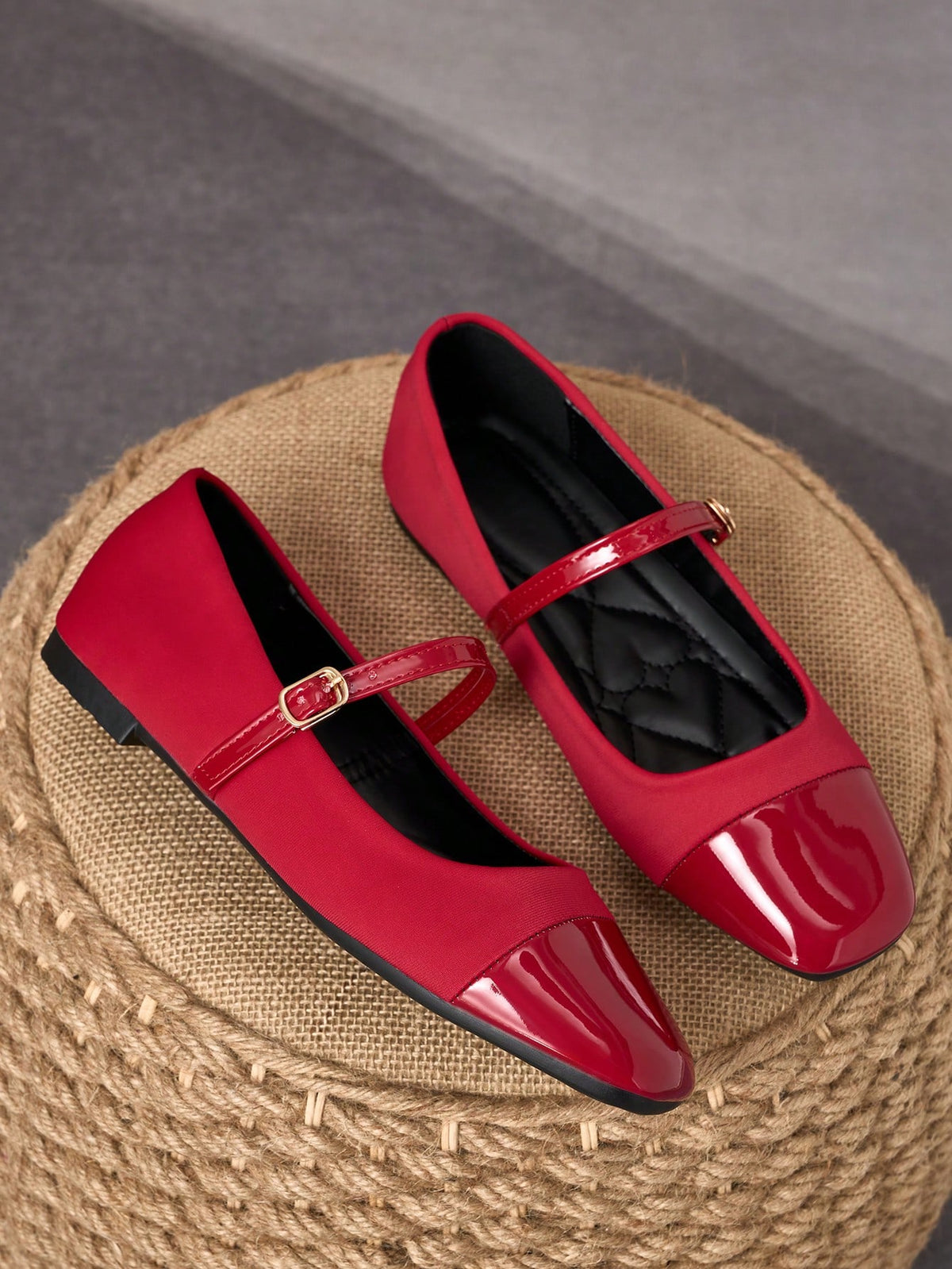 Pair of women's square toe slip-on flat shoes featuring a delicate bow detail and low vamp design.