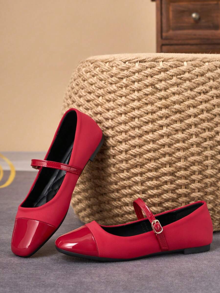 Pair of women's square toe slip-on flat shoes featuring a delicate bow detail and low vamp design.