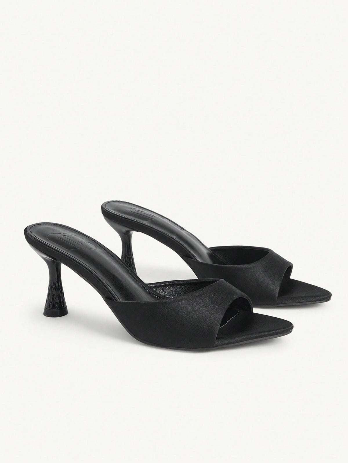 Elegant women's pointed toe heeled sandals with textured pattern and sleek stiletto heel