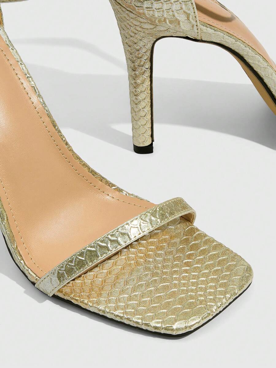 Square toe high-heeled sandals with thin straps, stiletto heel, and buckle ankle strap