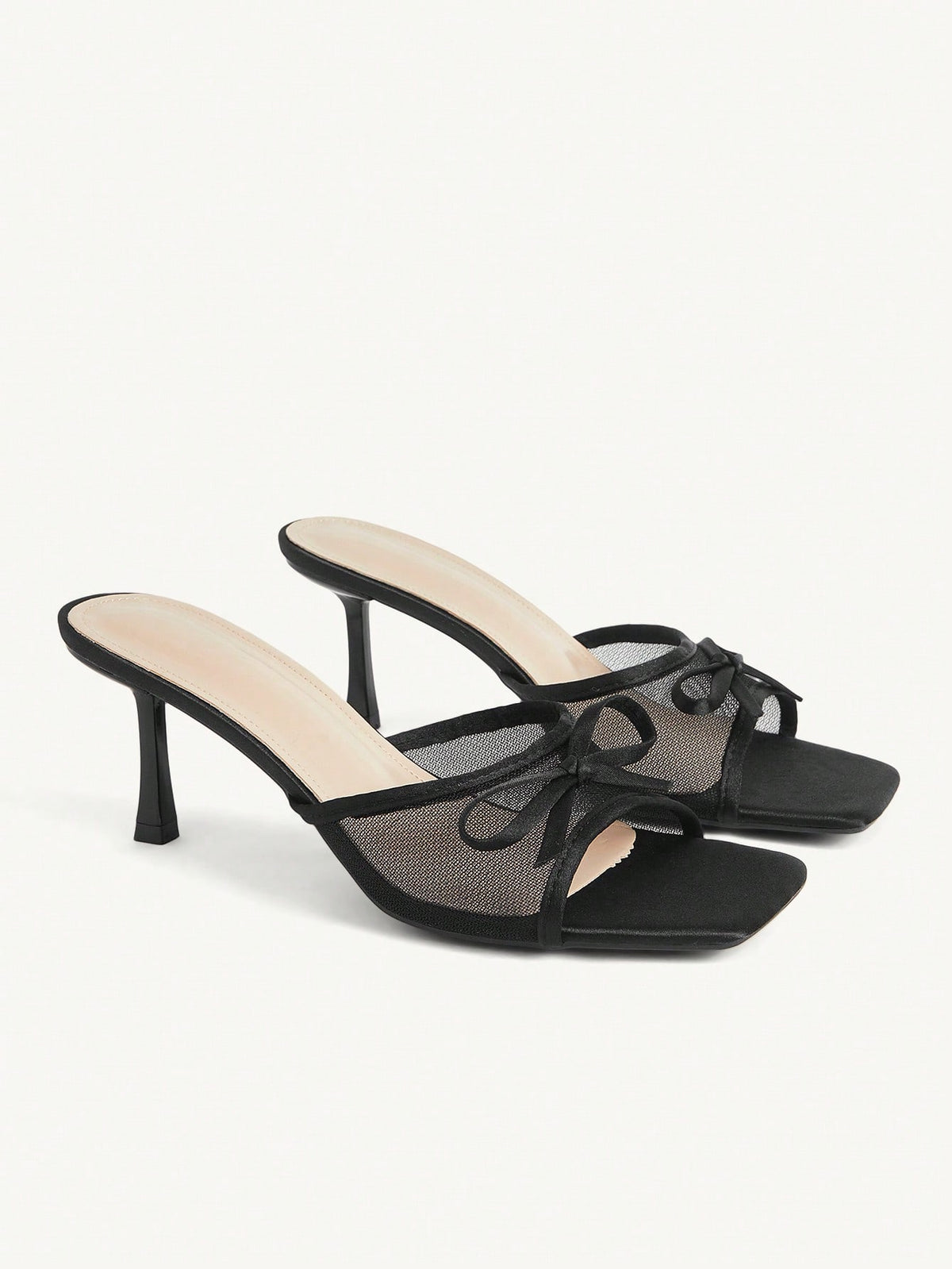 Pair of women's open toe stiletto heeled sandals crafted in satin with a bow accent