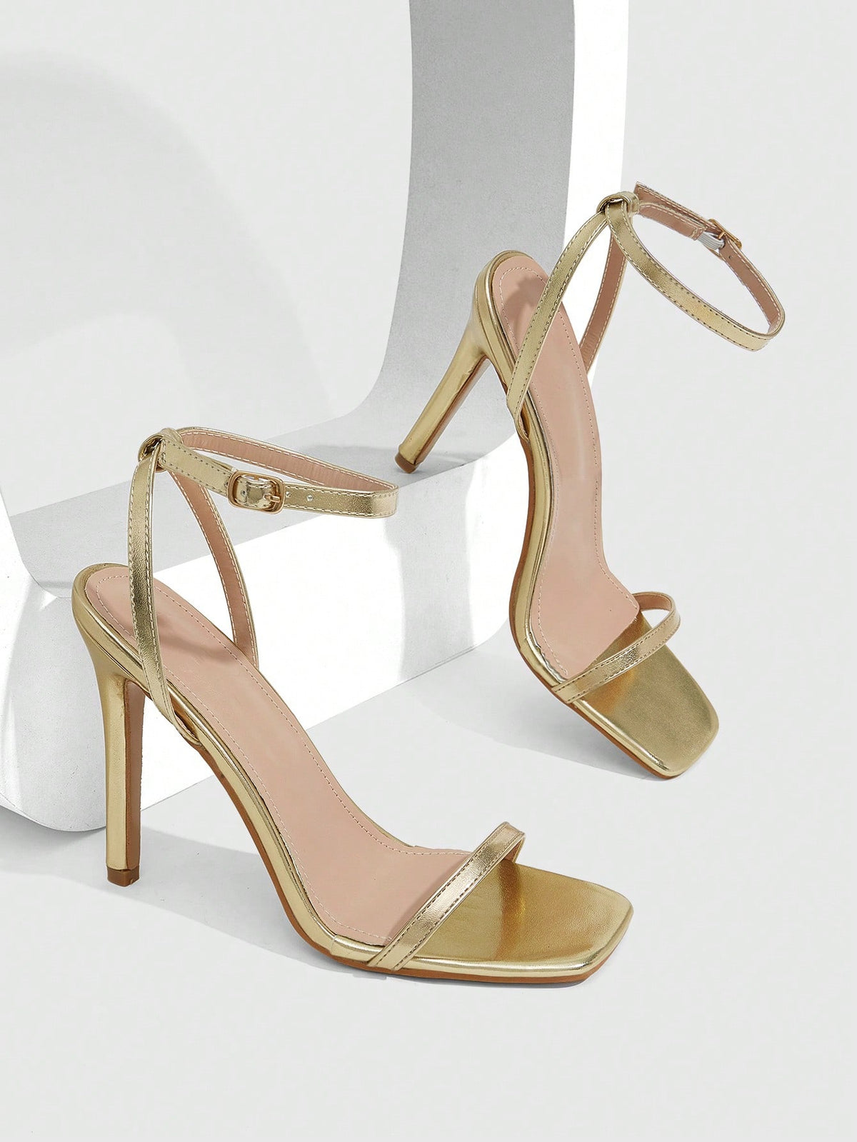 Square toe high-heeled sandals with thin straps, stiletto heel, and buckle ankle strap