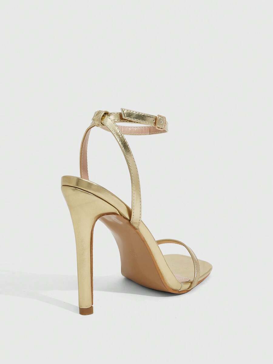 Square toe high-heeled sandals with thin straps, stiletto heel, and buckle ankle strap