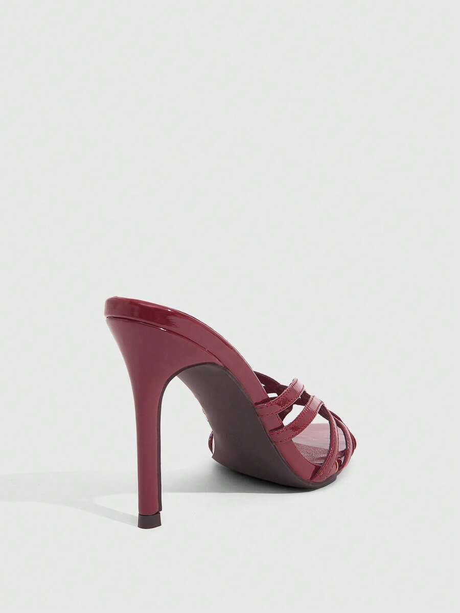 Women's brown flannel pointed open-toe heeled sandals featuring a slip-on mule design with high stiletto heels.