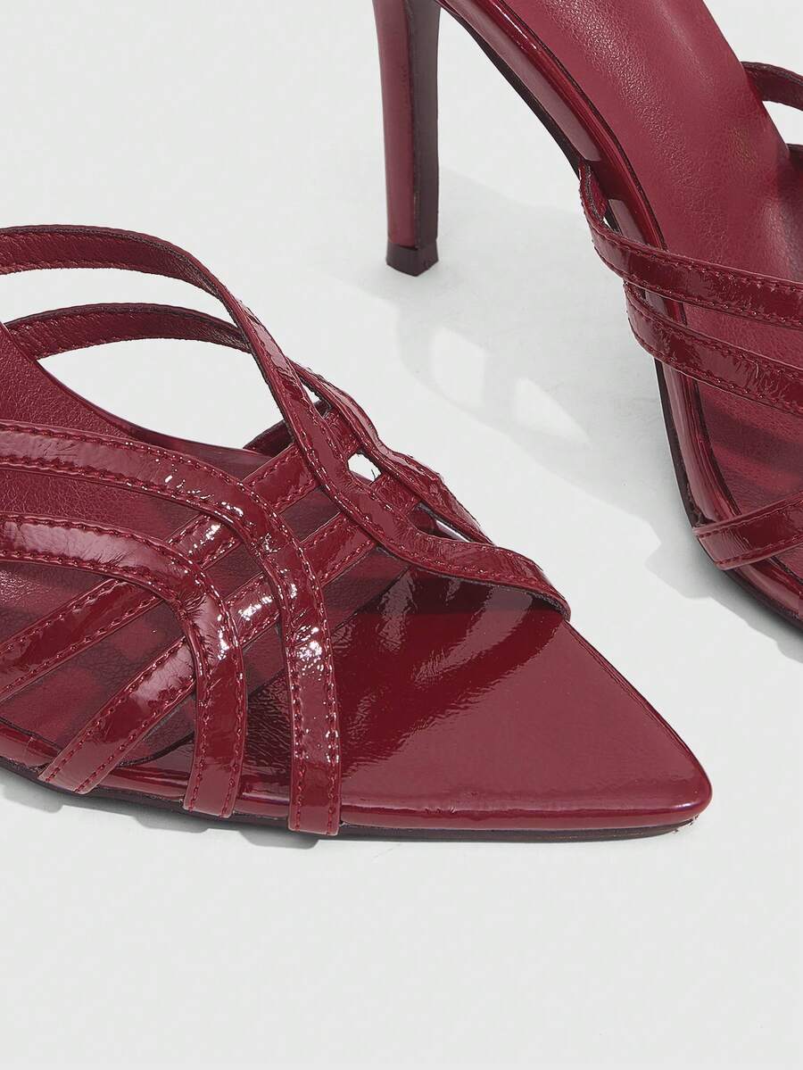 Women's brown flannel pointed open-toe heeled sandals featuring a slip-on mule design with high stiletto heels.