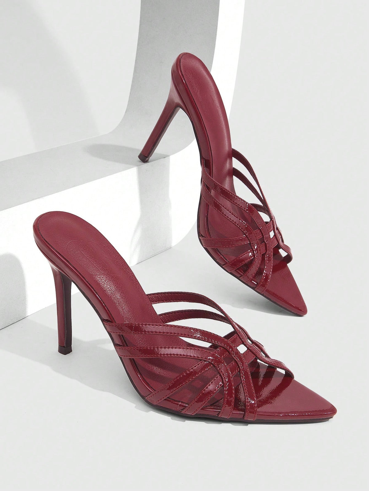 Women's brown flannel pointed open-toe heeled sandals featuring a slip-on mule design with high stiletto heels.