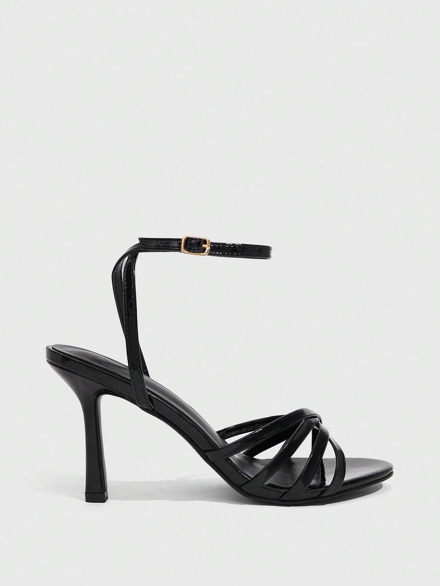 Women's high heel sandals featuring pleated strap detailing, an adjustable ankle strap with buckle closure, round open toe, and slim stiletto heel.