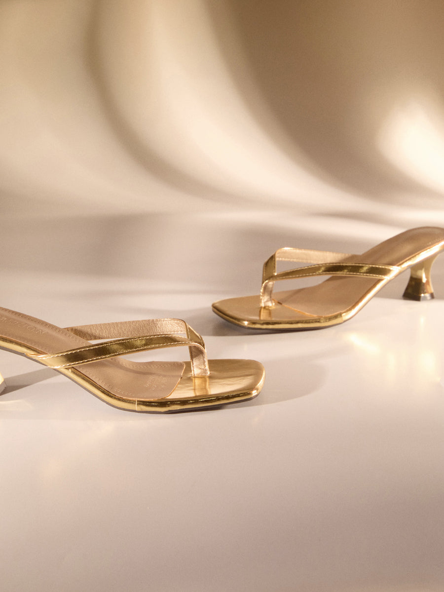 Gold metallic square toe high heel thong sandals for women with mid kitten heel and slip-on design