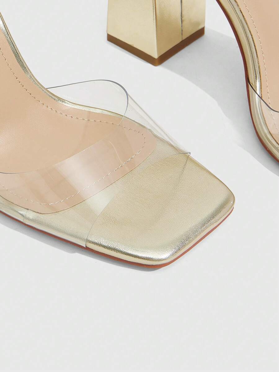 Women's criss-cross lace-up chunky high heel sandals with open square toe and strappy design.