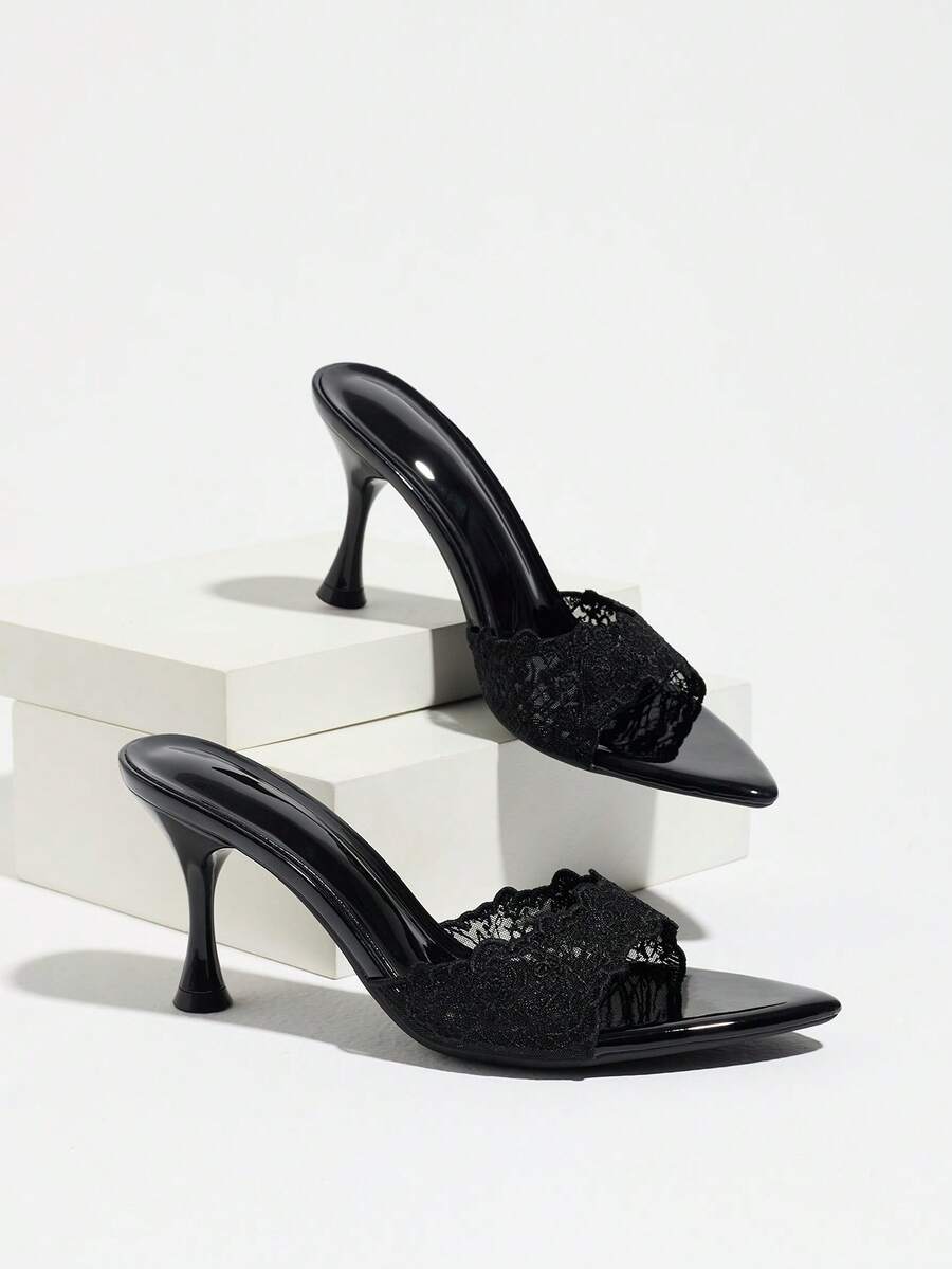 Women's pointed toe high heel mule sandals featuring a sleek slip-on design with elegant lace embroidery detailing