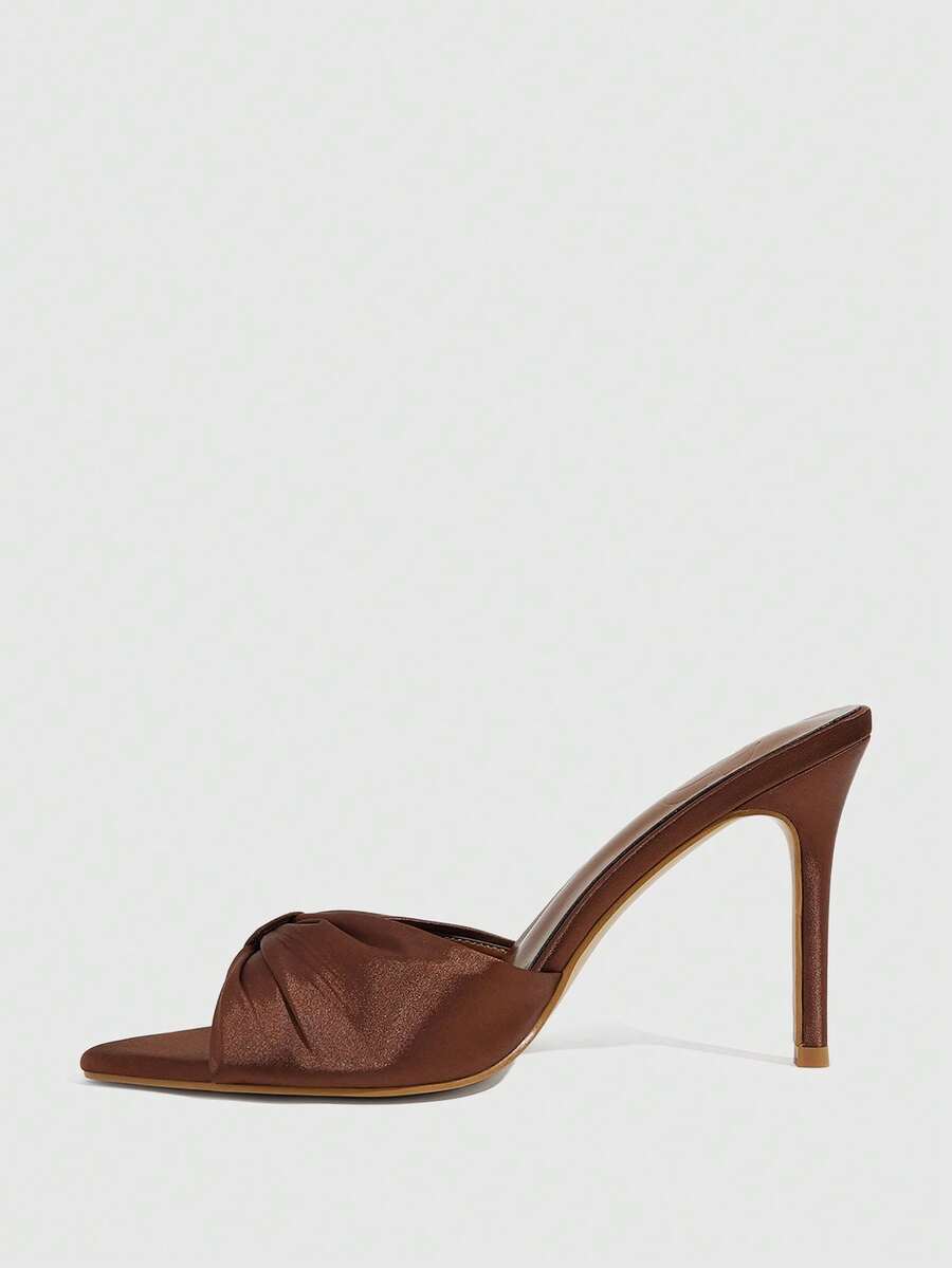 Women's bronze pleated satin stiletto sandals with an open toe design and adjustable buckle slingback strap.