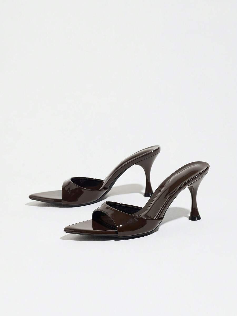 Women's open pointed toe stiletto mule high heel sandals featuring a glossy slip-on design.