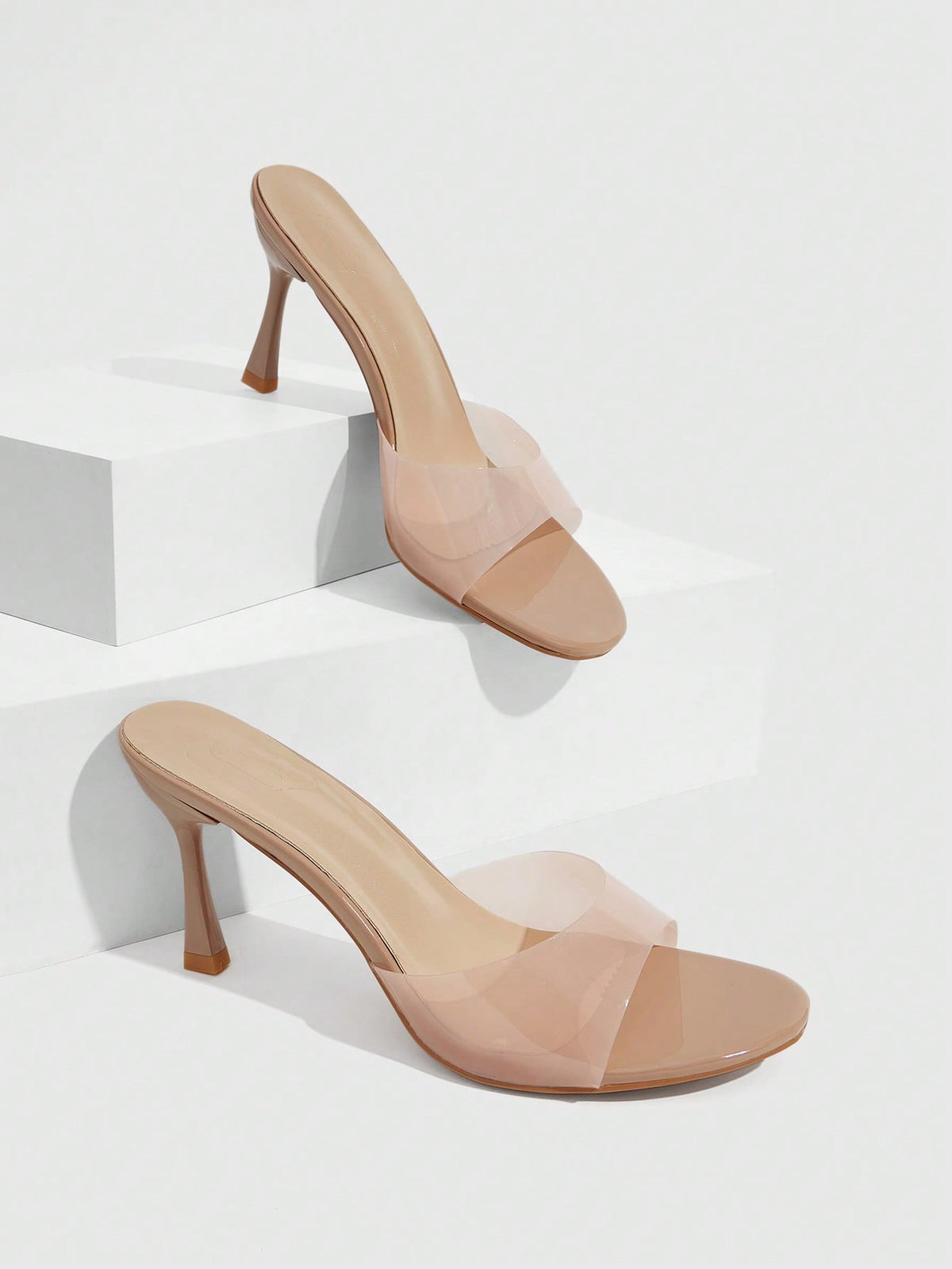 Square toe thin high heel slippers for women featuring an open toe design, stiletto heel, and buckle strap accent.
