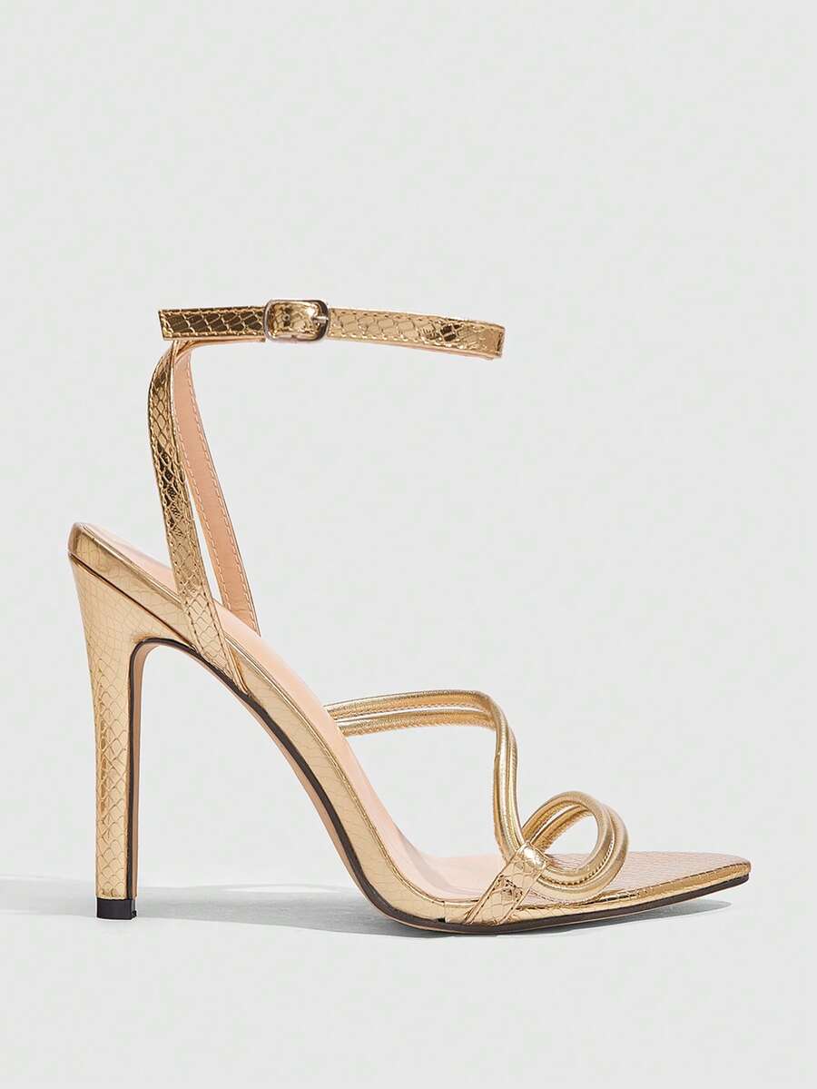 Snake pattern open toe high heel sandals with thin stiletto heel and buckle ankle strap for women.