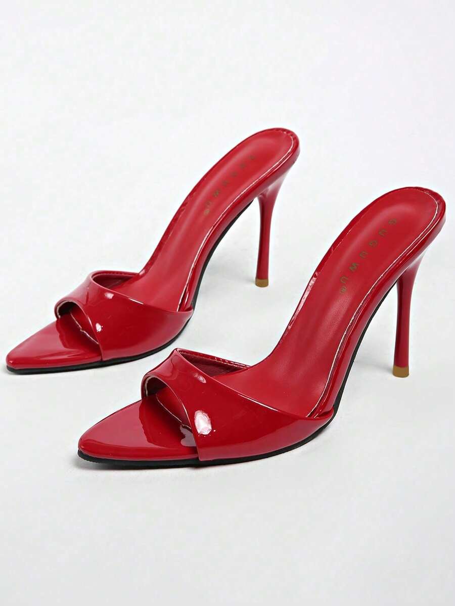 Patent leather open toe slingback slide sandals with stiletto high heels and slip on design.