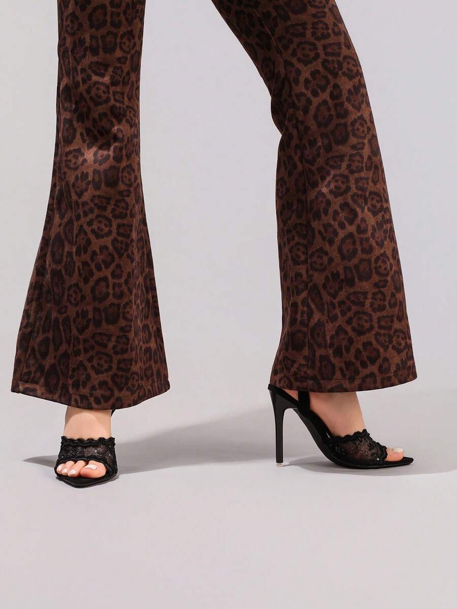 Lace stiletto high heel sandals with pointed open toe, ankle strap buckle, and bow detail