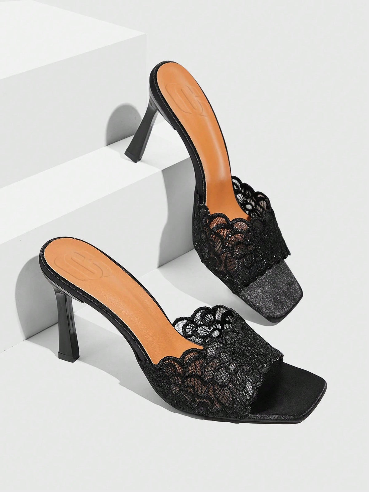 Women's square toe stiletto high heel slide sandals featuring contrast mesh embroidery and an open-toe backless design.