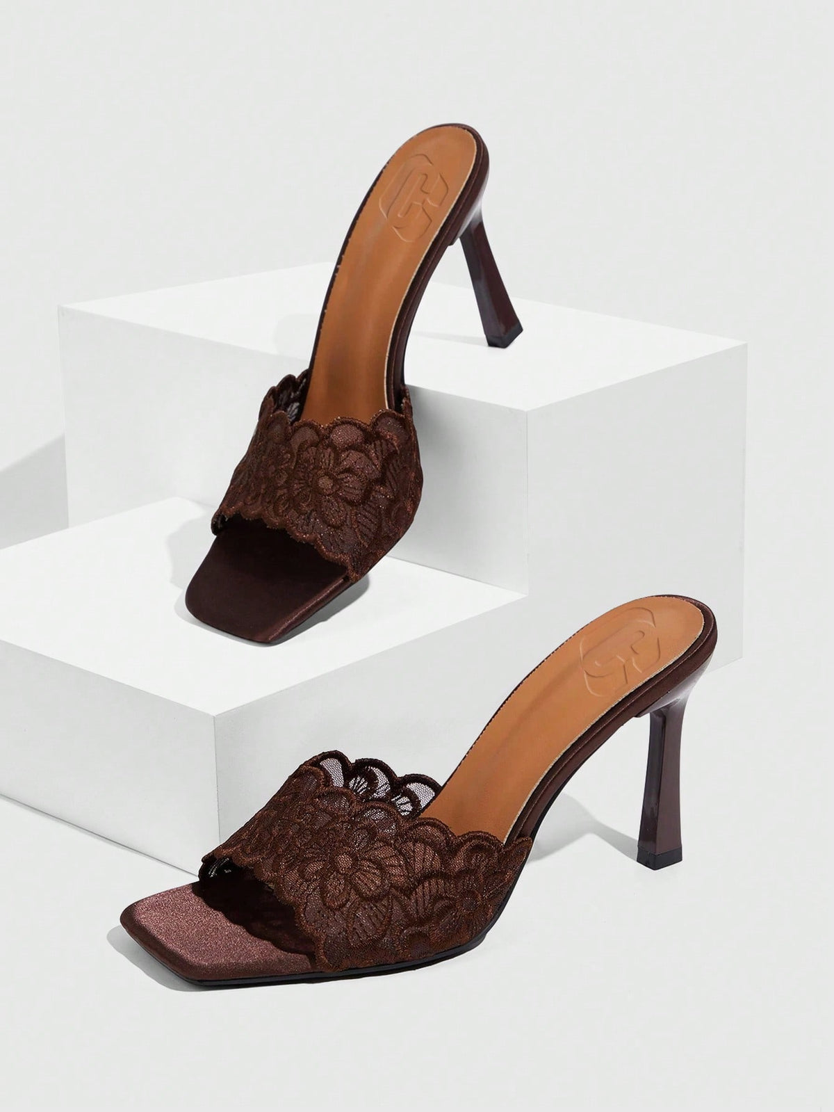 Women's square toe stiletto high heel slide sandals featuring contrast mesh embroidery and an open-toe backless design.