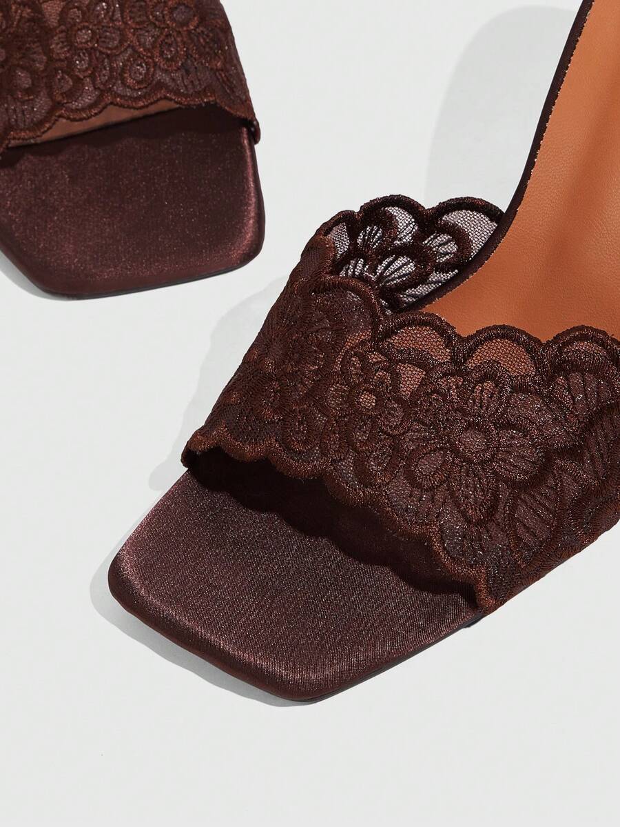 Women's square toe stiletto high heel slide sandals featuring contrast mesh embroidery and an open-toe backless design.