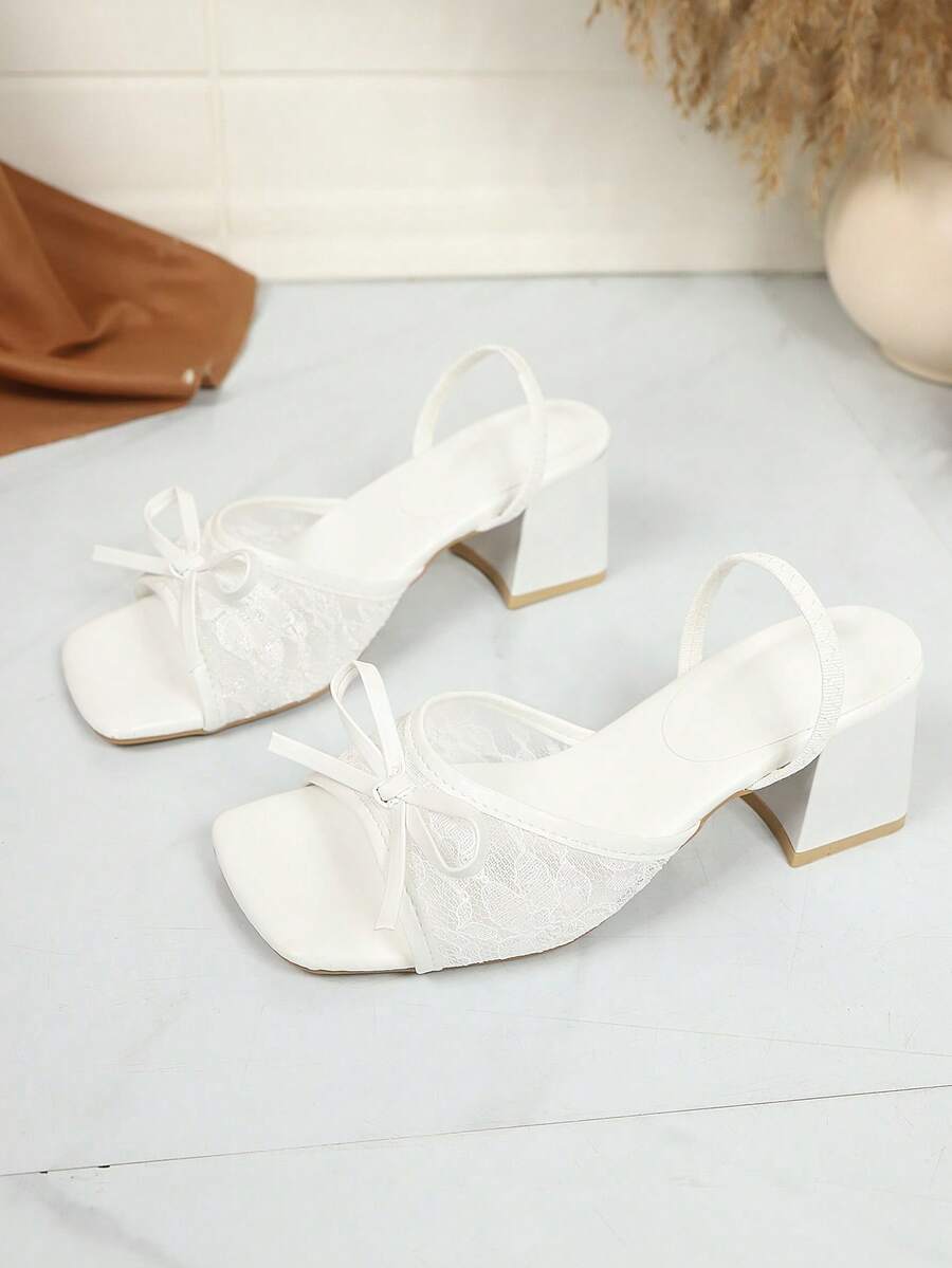 Square toe thin heel thong sandals for women featuring an open toe, bowknot detail, and slip-on slingback design.