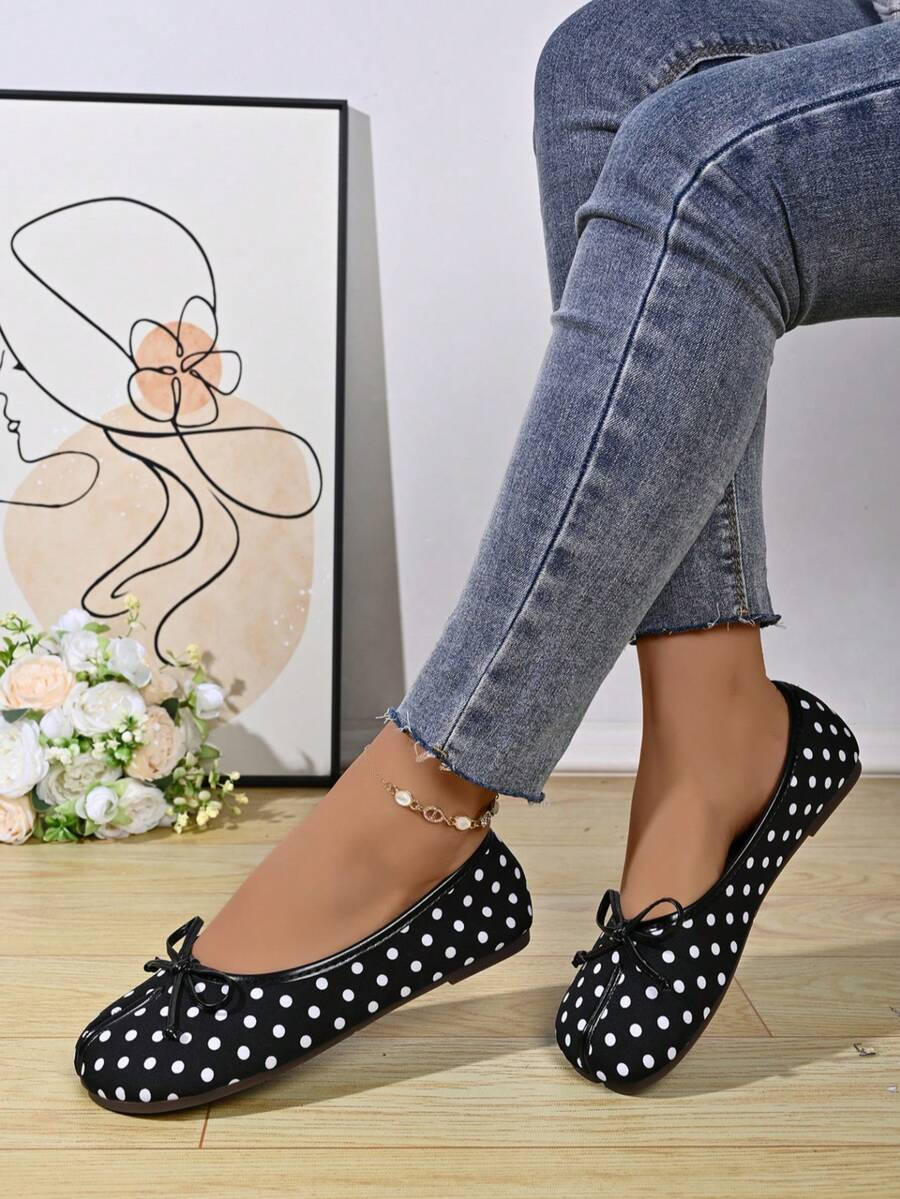 Women's white split-toe slip-on flat shoes with braided accent and rubber sole