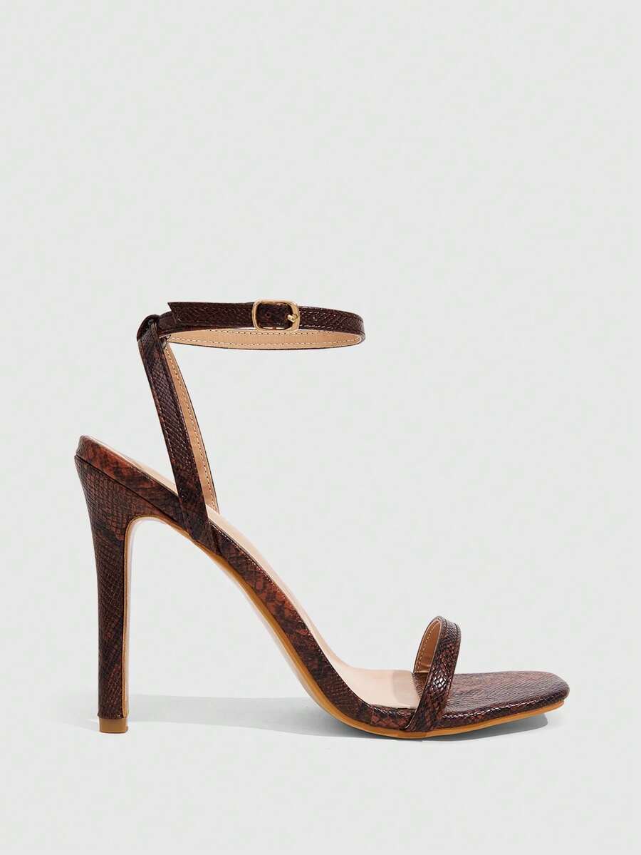Elegant women's open toe strappy heeled sandals with stiletto high heel and ankle strap buckle closure.