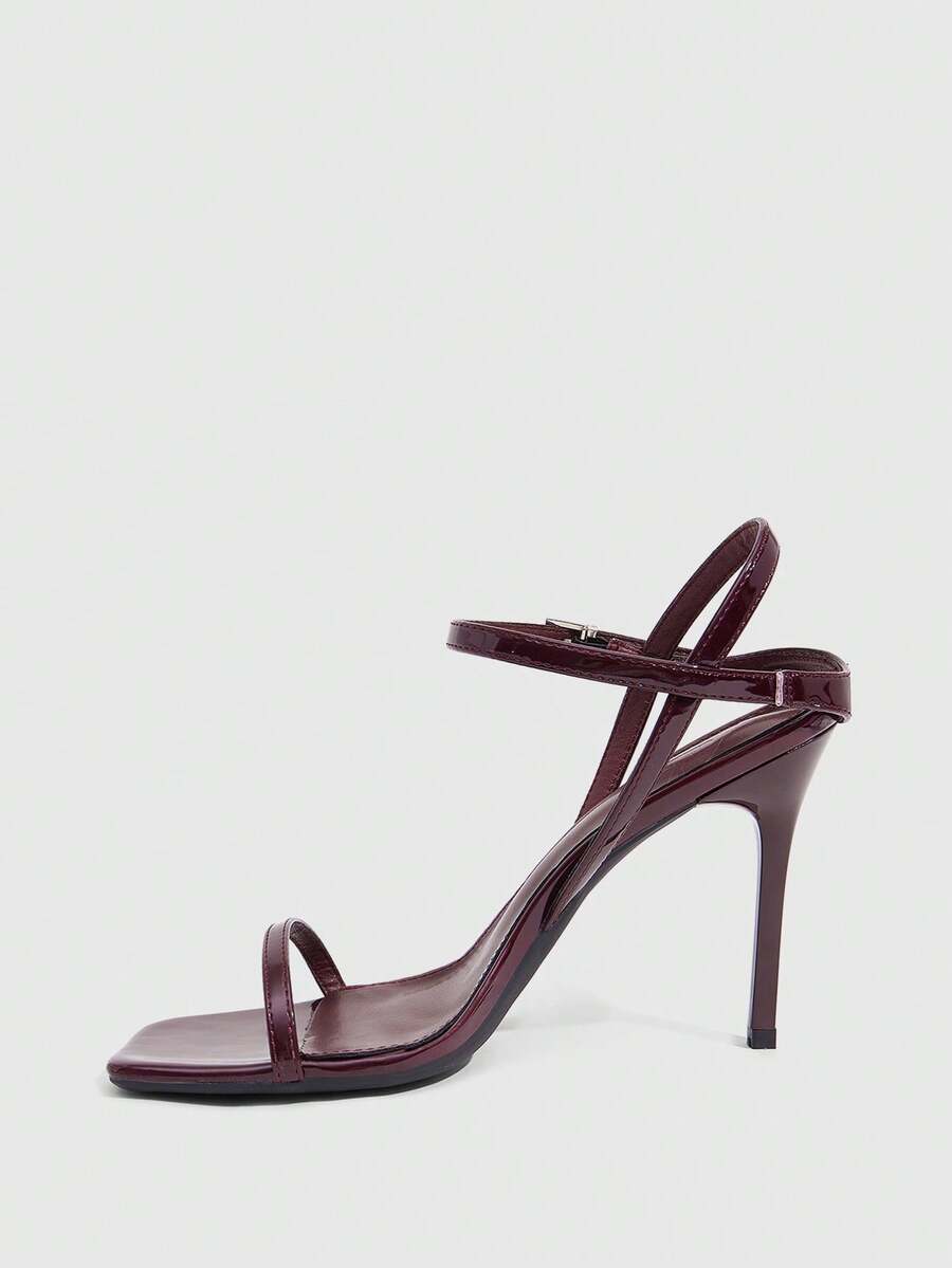 Women's metallic mirror finish square open toe stiletto high heel sandals with cross ankle straps and buckle closure