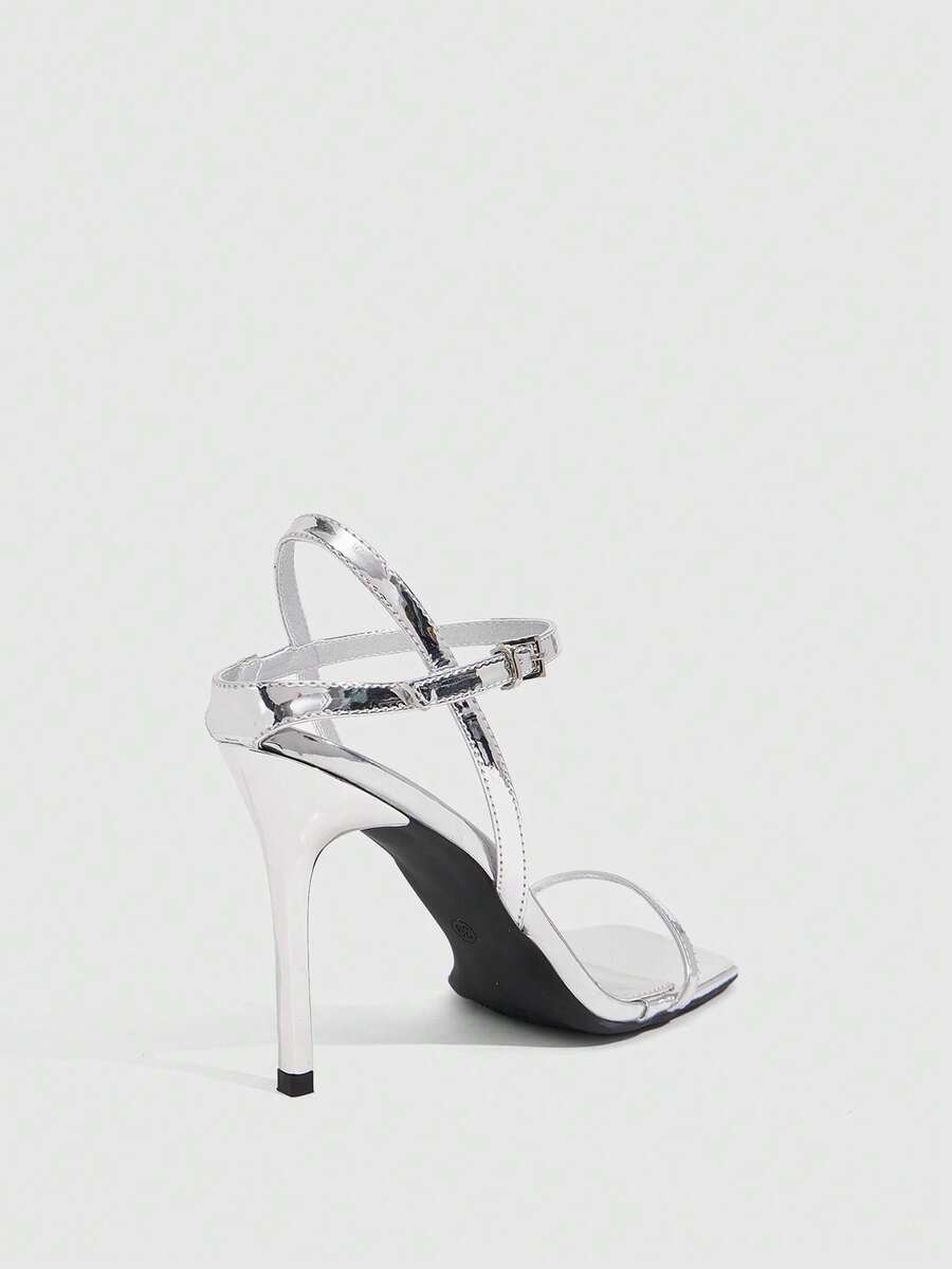 Women's metallic mirror finish square open toe stiletto high heel sandals with cross ankle straps and buckle closure