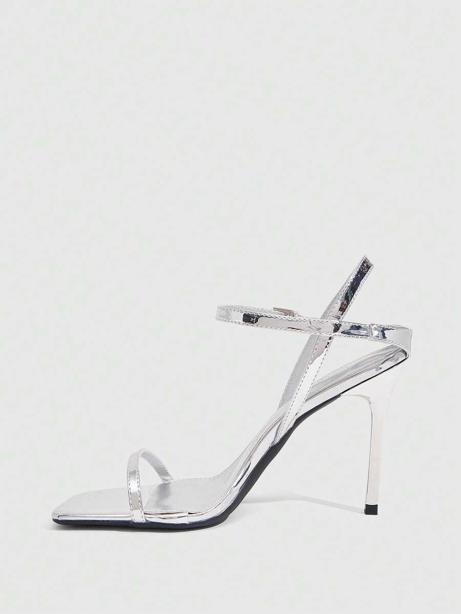 Women's metallic mirror finish square open toe stiletto high heel sandals with cross ankle straps and buckle closure