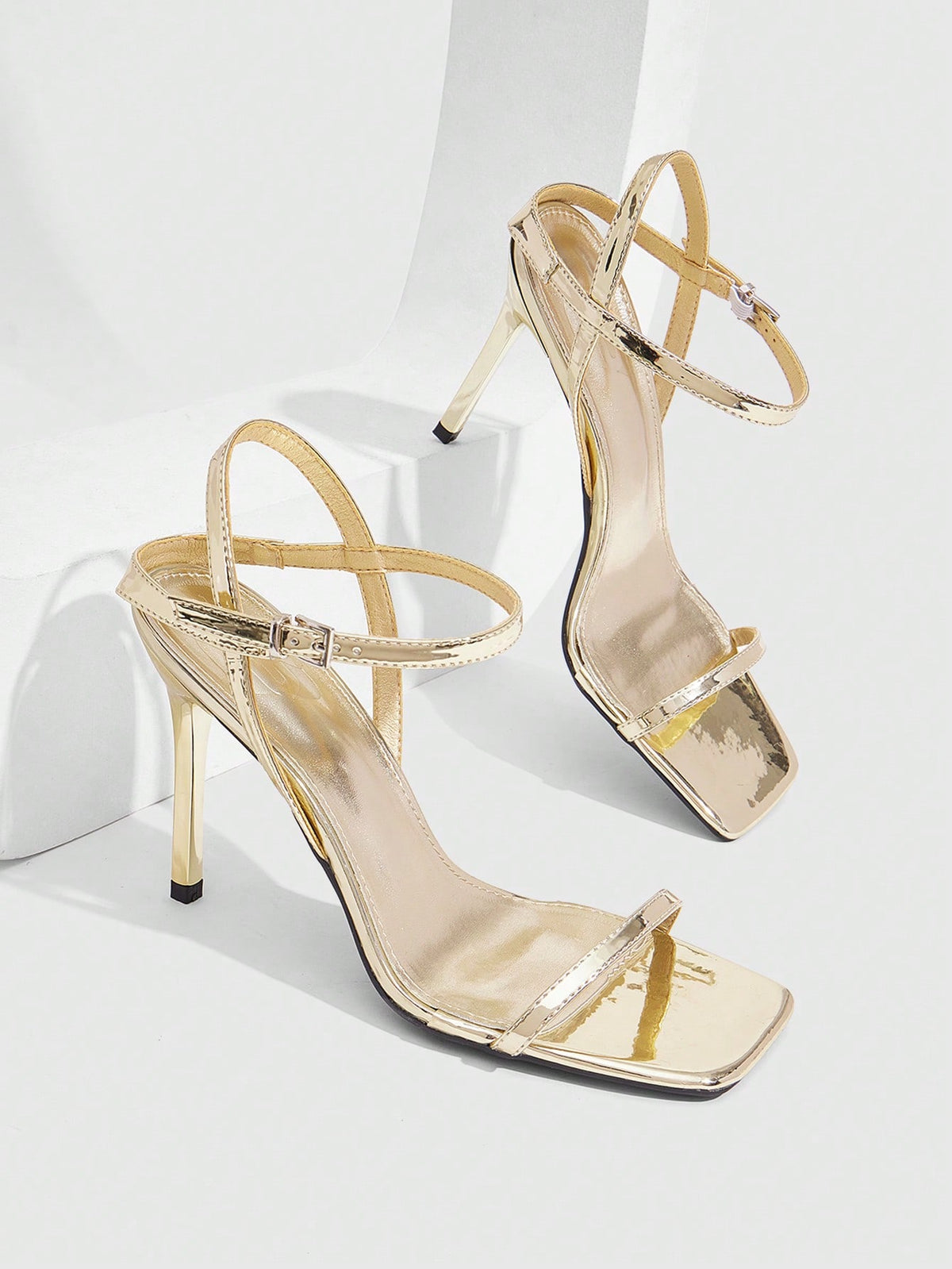 Women's metallic mirror finish square open toe stiletto high heel sandals with cross ankle straps and buckle closure