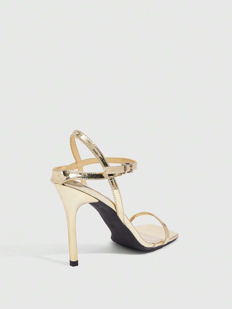 Women's metallic mirror finish square open toe stiletto high heel sandals with cross ankle straps and buckle closure