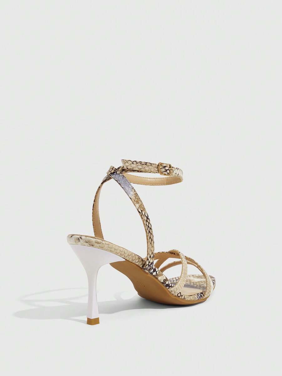 Square toe stiletto high heel sandals with crisscross strappy design and adjustable ankle buckle strap in light blue.