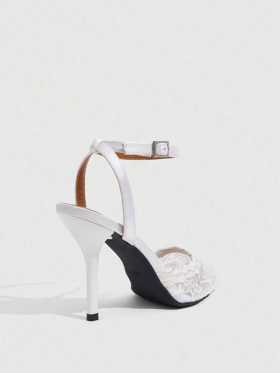 Women's stiletto high heel shoes featuring an elegant buckle detail and ankle strap slingback design.
