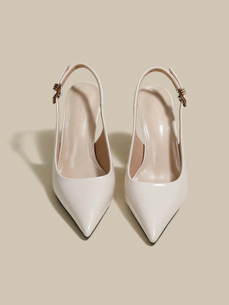 Women's pointed toe kitten heel pumps with adjustable buckle back strap and sleek patent finish.