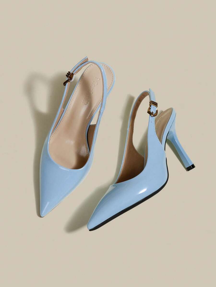 Women's pointed toe kitten heel pumps with adjustable buckle back strap and sleek patent finish.