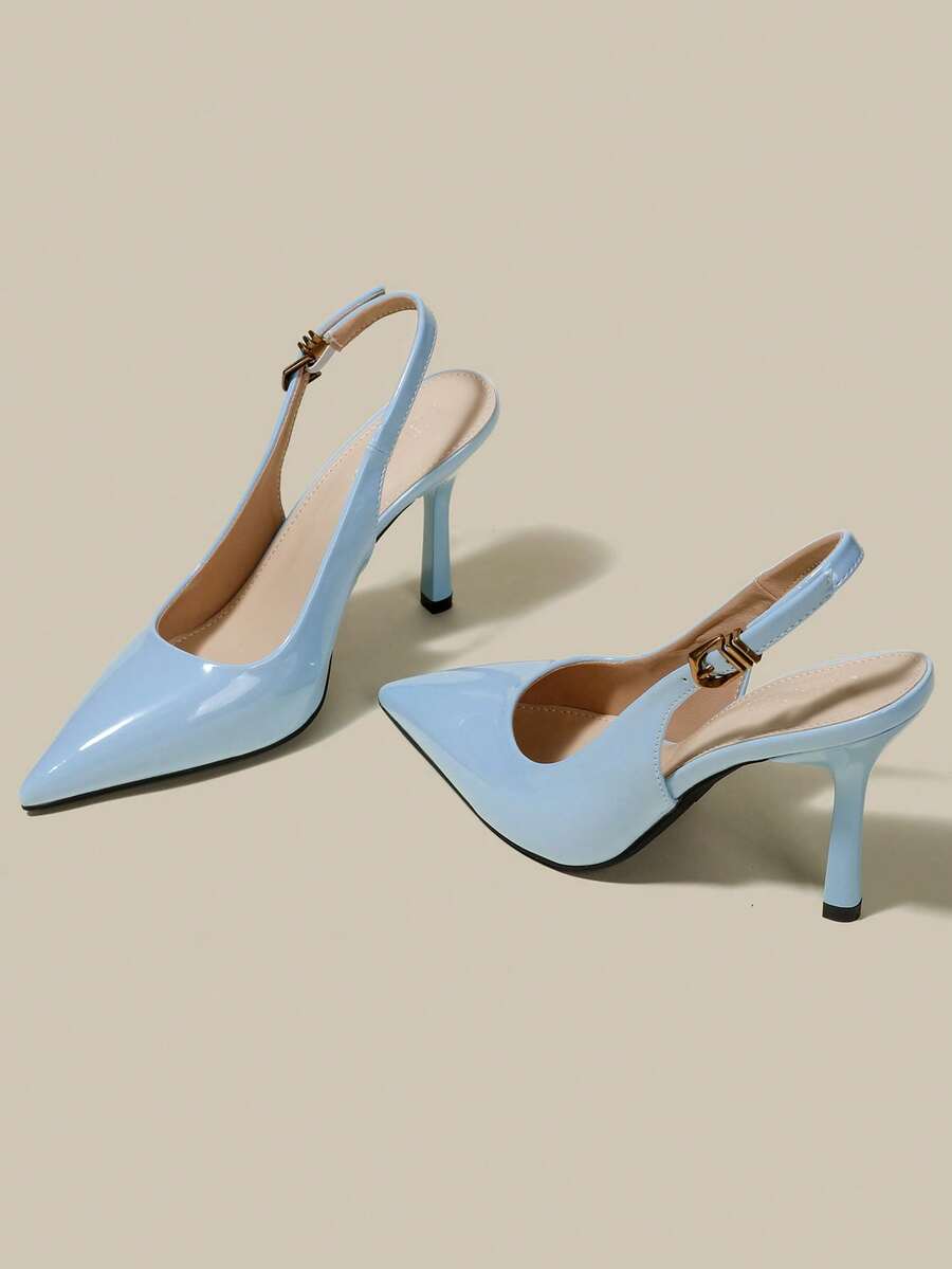 Women's pointed toe kitten heel pumps with adjustable buckle back strap and sleek patent finish.