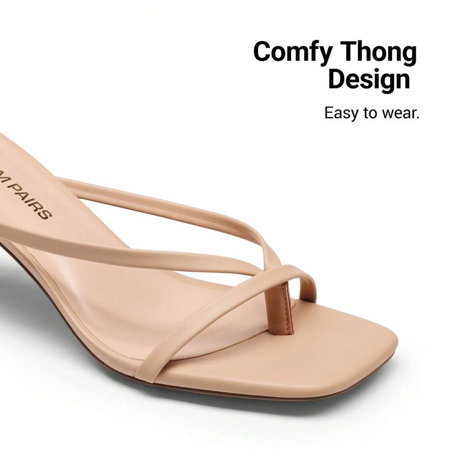 Women's metallic kitten low heel thong sandals featuring an open square toe and slip-on mule design.