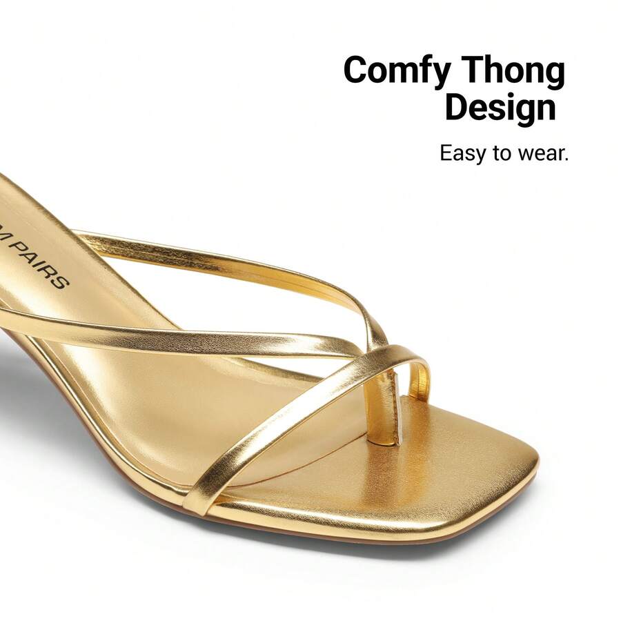Women's metallic kitten low heel thong sandals featuring an open square toe and slip-on mule design.